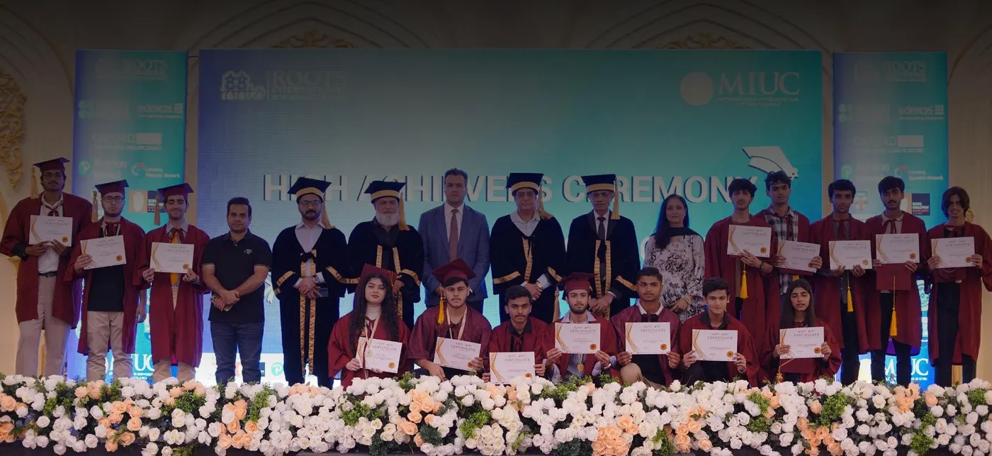 Graduates and faculty at the High Achievers Ceremony